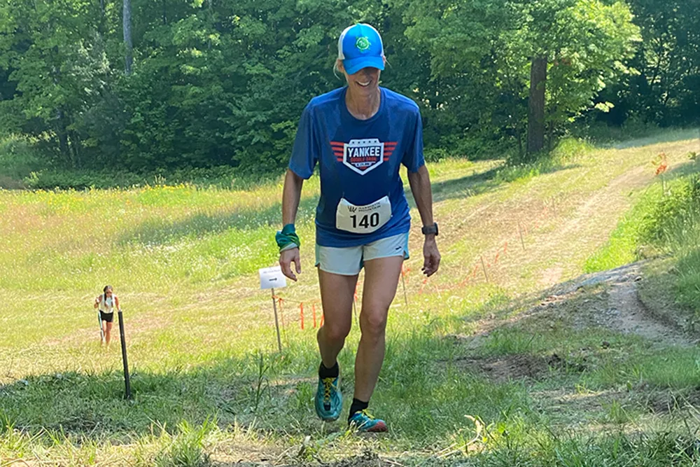 Woman Hiking uphill during rocket hill climb