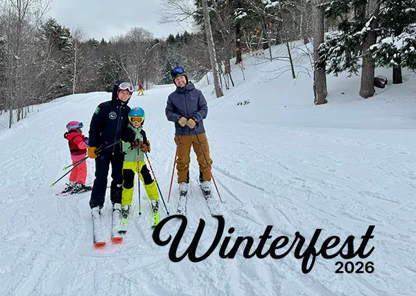 Family of 4 on ski trail with Winterfest 2026 event logo
